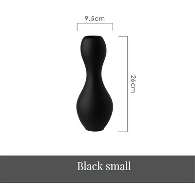 優雅 な 黒 と 白 の ボウリング ボール の デザイン を 備えた 現代 的 な ミニマリスト の 陶器 瓶