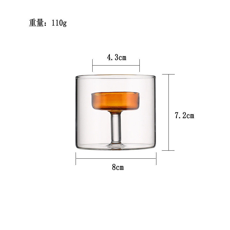 この 円筒形 ガラス の ろうそく の テーブル を 用い て,家庭 に 恋愛 の 雰囲気 を 作り出せ