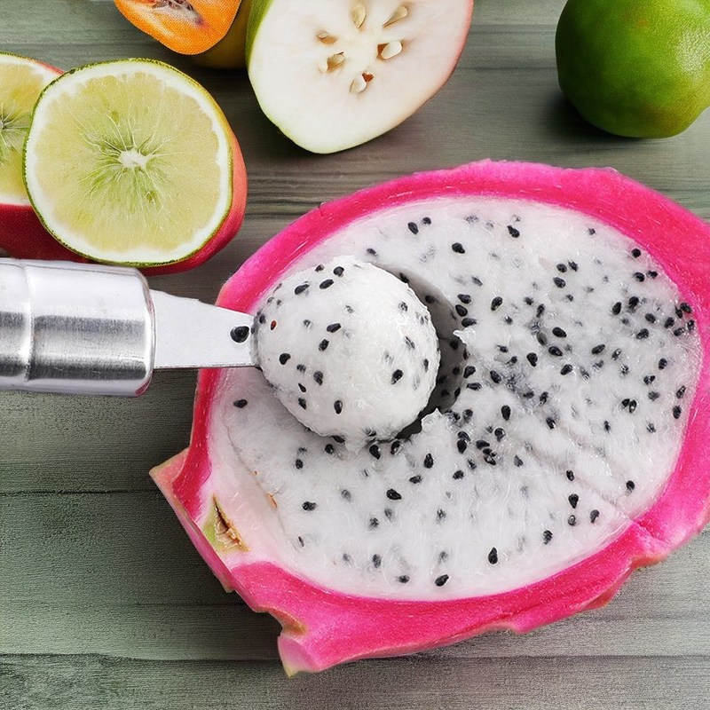 このステンレス鋼のキッチン用具で 野菜と果物を 簡単に切って